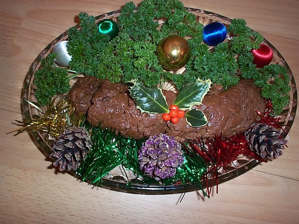 here is a tasty yuletide treat I prepared earlier "THE CHRISTMAS LOG" delicious