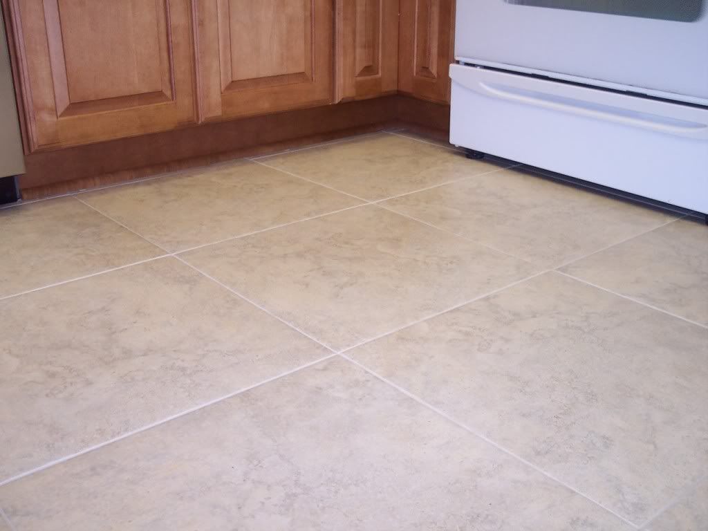 Rectified Tiles and 1/8th width grout line & color of grout.