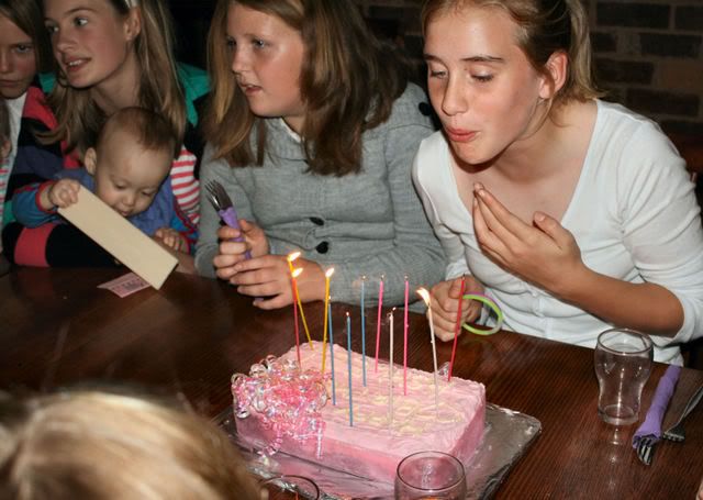 Ash blowing out candles