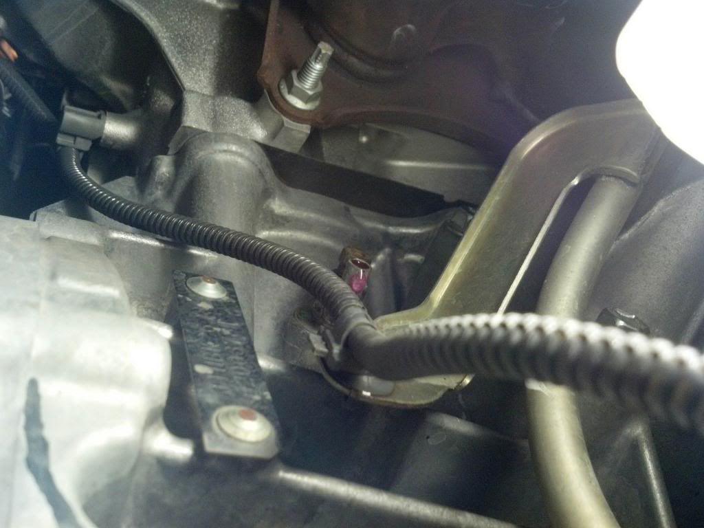 I attached a 3/8" piece of tubing from the drain to run the coolant down to my bucket.